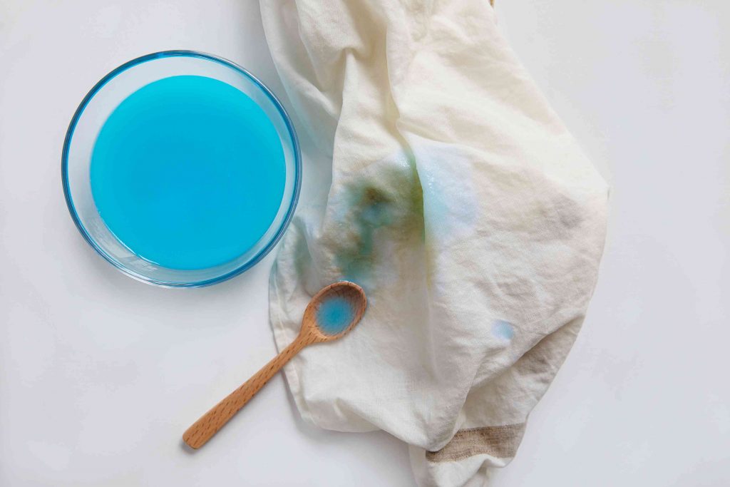 dish soap and cornstarch; how to get olive oil out of clothes