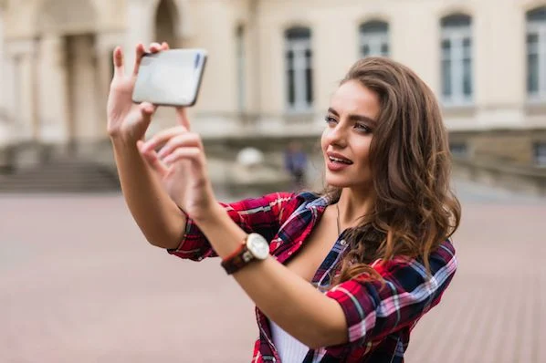 Girl posing for photo; What is the best time to post on Instagram on Monday