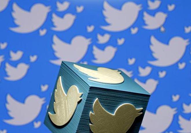 Twitter logo on a cube; Twitter circle feature