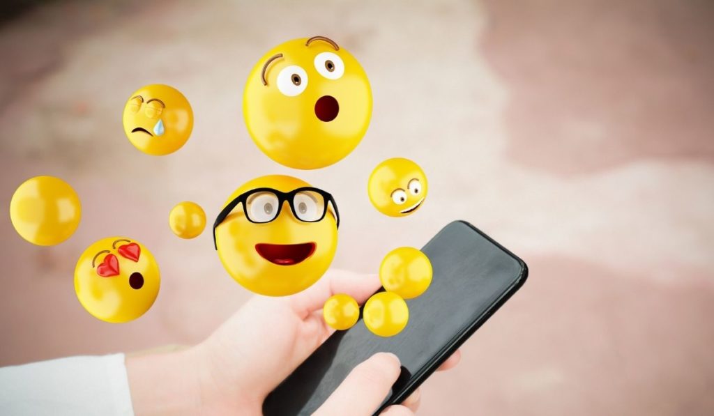Emojis flying from Mobile; How to Download iOS 14 Emoji on Android