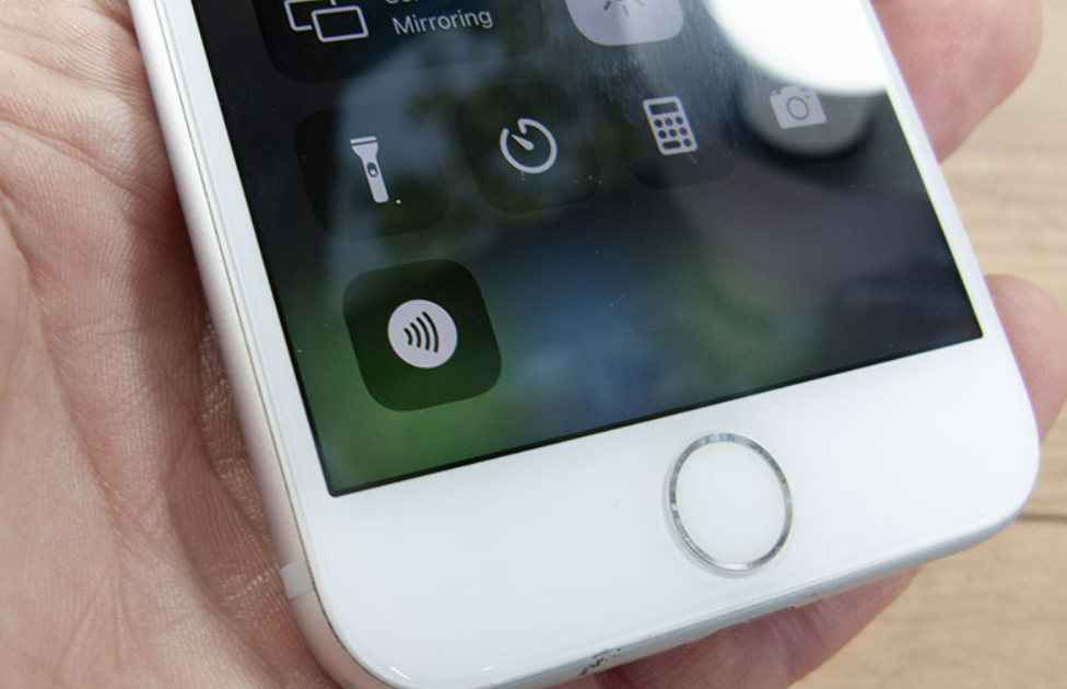 What is the NFC tag reader on iPhone for?