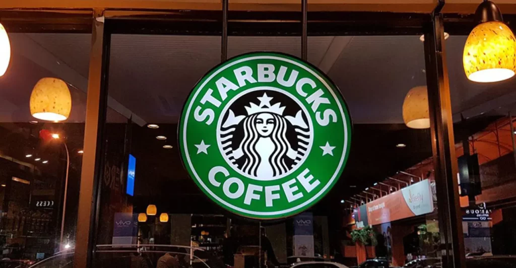 Логотип Starbucks, Откройте для себя Starbucks Wrapped 2023. Расскажите о лучших напитках и историях.