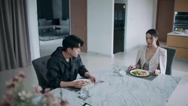 A man and  awoman having a meal on a dinner table; Where to Watch Bittersweet Revenge Chinese Drama & Is It On iQIYI?