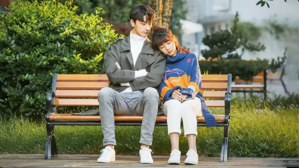 A boy and a girl sitting on a bench; Where To Watch The Grand Princess Chinese Drama